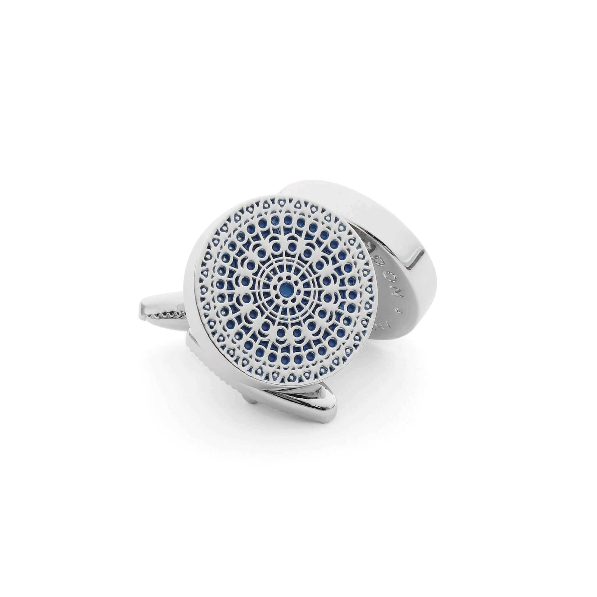 Sky blue and silver cufflink inspired by the circular gothic windows of Notre Dame Cathedral, featuring intricate rose window design.