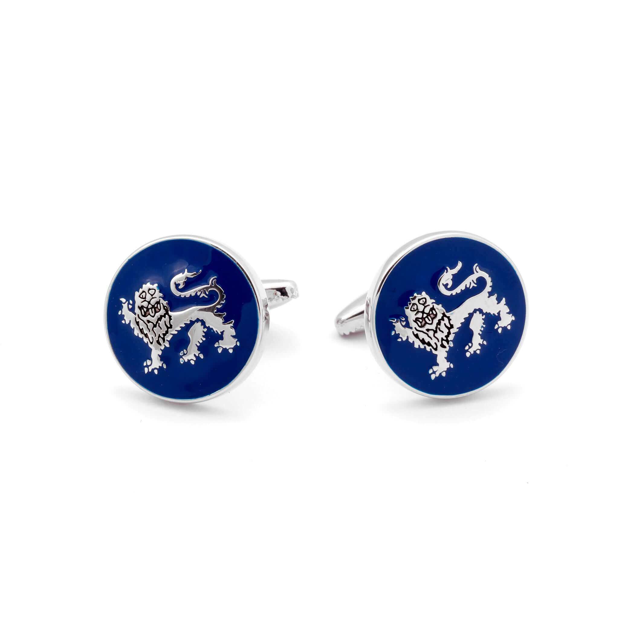 The English Leopard Gold Cufflink with historic lion depiction on blue background