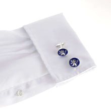 The English Lion Cufflink on white dress shirt, showcasing heraldic lion symbol of English royalty.