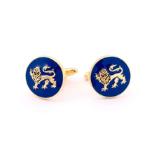 The English Leopard Gold Cufflink with blue enamel featuring passant guardant lion design, symbolizing British heritage and royalty.
